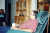 There is good ol' Dad relaxing in the recliner.